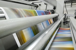 large offset Commercial Printing Services in action printing copies