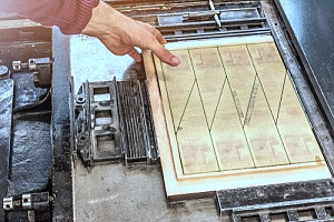 an individual performing commercial die cutting services