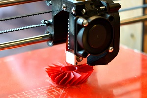 3D Printer Prints Red Form