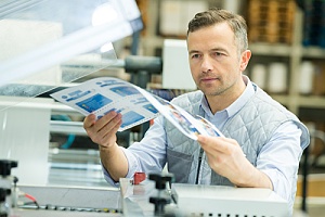 employee proofing clients printing project 