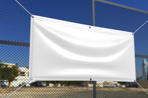 White blank vinyl poster fastened with a huge grille