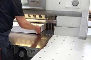 man on bulk printing machine