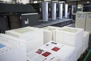 pallets of finished bulk printing products in paper printing warehouse